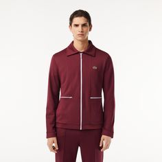 A new take on the sweatshirt, inspired by the Exploit tracksuit, released in Paris in 1977. A zipped design with a classic collar and chic pockets in an authentic rip-resistant piqué fabric. For a style that’s unique, just like you. Sporty Cotton Track Jacket For Work, Shoes And Sneakers, Lacoste Sport, Lacoste Men, 2024 Collection, Polo Shirts, Leather Goods, Men's Collection, Great Britain