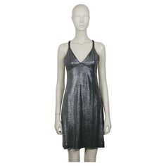 PACO RABANNE silver foil grid dress as worn by British Super Model KATE MOSS. Top surface is silver foil printed creating a metallic chain mail effect on a black knit spandex base. Cross back shoulder straps. Label reads PACO RABANNE Paris. Made in France. Size tag reads : 38. Please double check measurements. Composition tag reads : 91% Triacetate / 9% Polyamide. Indicative measurements taken laid flat and unstretched (double bust, waist and hips) : bust approx. 32 cm (12.60 inches) / waist approx. 34 cm (13.39 inches) / hips approx. 43 cm (16.93 inches) / length approx. 86 cm (33.86 inches). NOTES - This is a preloved vintage item, therefore it might have imperfections. - Most clothes may have been reviewed by a seamstress. - Colors may differ slightly from actual product appearance due Grid Dress, Silver Foil Printing, Fabric Pilling, Super Model, Chain Mail, Paco Rabanne, Sewing Project, Kate Moss, Silver Foil