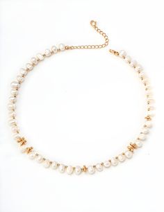 This Vintage Gold Pearl Necklace embodies timeless elegance and sophisticated charm. Crafted from high-quality 925 silver and adorned with natural pearls, this necklace adds a touch of class to any outfit.  The delicate pearls, ranging from 5-8mm, are beautifully complemented by the vintage gold accents. The necklace measures approximately 38cm in length with a 6cm extension, making it versatile for various necklines and styles.  Whether you're attending a wedding, a formal event, or simply want to elevate your everyday look, this chic necklace is the perfect accessory. Treat yourself or gift this exquisite piece to someone special and let its beauty enhance any jewelry collection. Materials: 925 Silver, Natural Pearl Color: Vintage Gold Size: Chain length approximately 38cm + 6cm extensio White Pearl Necklace Clavicle Chain For Anniversary, White Pearl Clavicle Chain Necklace For Anniversary, White Pearl Necklace With Clavicle Chain For Anniversary, White Pearl Collar-length Necklace For Anniversary, Pearl White Clavicle Chain Pearl Necklace For Anniversary, Anniversary Clavicle Chain Pearl Necklace, Anniversary Clavicle Pearl Necklace, Anniversary White Pearl Chain Necklace, White Pearl Embellished Necklaces For Anniversary