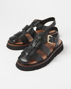 Bringing back a classic, these black leather fisherman sandals with chunky black soles and gold-toned buckles are going to be your next closet staple. Leather Fisherman Sandals, Green Leather Sandals, Chunky Black Sandals, Leather Gladiator Sandals, Fisherman Sandals, Sandals Outfit, Beautiful Sandals, Leather Heels Sandals, Oliver Bonas