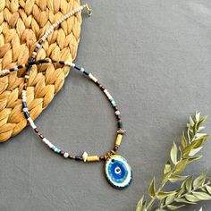 🌟 Designed for those who like to be original and looking for unique jewelry  ✅ Each piece is hand-shaped and drawn by us, making it wonderfully unique--so, expect a bit of delightful variation from the pictures 🍀 Because of their handmade charm, every ceramic piece is entirely one-of-a-kind. These high-quality creations are made to last, just like the memories you'll create with them!  🎁 It is suitable for every day , it can also be purchased as a perfect gift for special days like Valentine's Day, Mother's Day, Christmas or Birthday gift 🧿 Turkish evil eye  The evil eye symbolizes protection from bad energy and envy in Turkish and Middle Eastern culture The evil eye bead is believed to bring good vibes and good luck, we hope it will give you the same feeling! 📦 Packing :  All necklac Multicolor Evil Eye Necklace For Gift, Multicolor Evil Eye Necklace As Gift, Multicolor Amulet Beaded Necklaces As Gift, Handmade Spiritual Pendant Beaded Necklaces, Symbolic Round Beads Necklaces As Gift, Symbolic Round Beads Necklaces For Gifts, Handmade Spiritual Necklaces As Souvenir, Unique Pendant Necklace For Souvenirs, Amulet Pendant Jewelry Souvenir