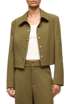 Layer on a military-inspired jacket cut from structured twill in a contemporary cropped silhouette. Front snap closure Spread collar Four-snap cuffs 60% polyester, 29% rayon, 8% other fibers, 3% spandex Dry clean Imported Military Style Utility Jacket With Button Cuffs For Work, Military Utility Jacket With Button Cuffs For Workwear, Khaki Cropped Jacket For Work And Fall, Chic Khaki Cropped Jacket For Work, Fitted Utility Jacket With Button Cuffs For Work, Spring Military Style Workwear Blazer, Cropped Utility Jacket For Fall Workwear, Chic Utility Jacket With Button Cuffs For Work, Fall Office Cropped Jacket With Button Cuffs