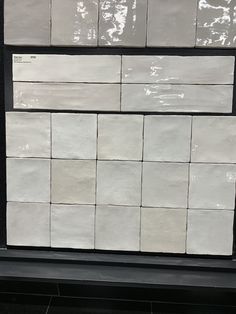 several white tiles stacked on top of each other