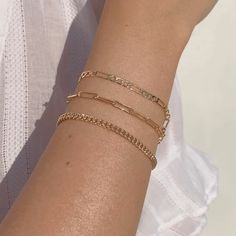 Our Figaro chain bracelet is a gold staple to wear alone or stack with our other gold filled bracelets. Our 14k gold-filled jewelry is plated with real 14k gold over brass and is water and tarnish resistant. 14k gold-filled jewelry is a great alternative to solid gold, and can be worn by people with sensitive skin. The color will not tarnish but recommend to keep away from liquids, perfumes and lotions. BUY 2, GET 1 FREE. Coupon applied at checkout. - 14k gold-filled- Chain width: 3.5 mm. - Chai Perminant Bracelet, Permenant Bracelet Gold, Trendy 14k Gold Filled Bracelet With Adjustable Chain, Trendy 14k Gold Tarnish-resistant Bracelets, Tarnish Resistant Rose Gold Plated Chain Bracelet, Stackable Rose Gold Bracelets In 14k Gold Filled, Dainty Gold Paperclip Bracelet In 14k Gold Filled, Gold-tone 14k Gold Filled Bracelet With Adjustable Chain, 14k Gold Filled Yellow Gold Bracelet With Gold Chain