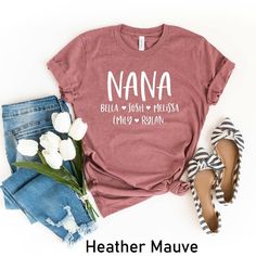 Nana Shirt, Personalized Nana T-shirt, Nana-life Shirt, Grandmother Shirt, Mother's Day Shirt, Grandma Shirt With Grandkids Names, Nana Tee Welcome to AuroraConceptDesign! ❤️ 👉🏻 PROCESSING TIME: - 3-5 business days. - Please contact with us if there is a rush order. 👉🏻 DELIVERY TIME: - Standard Shipping:  3-5 business days - Expedited Shipping  1-3 business days 👉🏻 CARE INSTRUCTIONS: - Machine wash cold and tumble dry low.  - Do not iron directly onto the design. - Do not bleach. We offer wide variety of products, including Unisex T-shirts, Women's V-neck T-shirts, Unisex Long Sleeve T-shirts, Youth T-shirts, Toddler T-shirts, and many more. Swipe listing images and check all the colors available for each type of shirt. Please enter the shirt and text color desired for your shirt in Nana Tee Shirts, Family Matching Cotton T-shirt Gift, Personalized Family Matching T-shirt For Summer, Casual Pre-shrunk T-shirt For Family Reunion, Cute Cotton T-shirt For Family, Family Matching Soft-washed Cotton Tops, Casual T-shirt With Text Print For Family Reunion, Casual Relaxed Fit Tops For Family Reunion, Custom Print Cotton T-shirt For Family