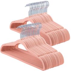 three pink hangers are stacked on top of each other