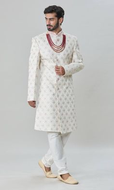 Off-white sherwani with floral and thread embroidery. Comes with pant. - Aza Fashions White Straight Kurta Bandhgala For Wedding, White Dabka Sherwani Traditional Fit, White Naqshi Ceremonial Sets, Ceremonial White Naqshi Sets, White Naqshi Sets For Ceremonial Use, White Cutdana Sherwani For Reception, White Long Bandhgala With Cutdana, White Long Bandhgala With Chikankari Embroidery, White Long Bandhgala For Ceremonial Occasions