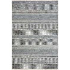 a gray and white rug with lines on it