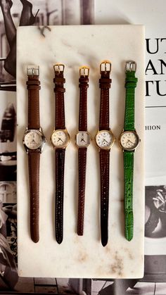 Super rare find Ladies watch collection (1980s-1990s) 1. Trussadi 2. Alba Seiko 3. Ricoh - gold filled on the corners 4. Seiko Avenue 5. Seiko Avenue - brass case * All working. * Sold as-is. These are vintage watches - no warranty. * Due to the nature of vintage/pre-owned timepieces there may be signs of wear and cosmetic imperfections not to be considered as defects. Please purchase if fully committed. Vintage Gold Watch Bands, Vintage Rectangular Watch For Everyday, Vintage Gold Watch Accessories With Analog Display, Gold Retro Watch With Round Dial, Vintage Rectangular Watches For Everyday Use, Retro Gold Watch Accessories With Round Dial, Vintage Gold Watch Accessories For Everyday, Vintage Gold Watch With Analog Display, Retro Gold Watches With Subdials