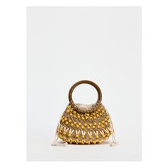 Mini bucket bag with beaded exterior. Wood handle. Knot and drawstring closure. Height x Length x Width: 4.9 x 7.7 x 3.3 inches (12.5 x 19.5 x 8.5 cm) Zara Bucket Bag For Vacation, Zara Bucket Bags For Vacation, Summer Beaded Brown Shoulder Bag, Summer Brown Beaded Shoulder Bag, Bucket Bag With Pearl Handle, Summer Beaded Bag Fashion Accessory, Summer Fashion Beaded Bag, Summer Beaded Bags As Fashion Accessory, Everyday Beaded Bucket Shoulder Bag