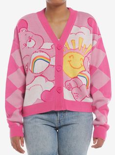 Keep cozy in Care-A-Lot! This knit Care Bears cardigan features diamonds knit down the sleeves and Cheer Bear on either side. Comes with bear-y cute heart-shaped buttons down the center.100% acrylicWash cold; dry flatImportedListed in junior sizesModel is 5'9"Model wears size Small Care Bear Accessories, Cute Clothing Items, Care Bears Clothes, Christmas Clothes Aesthetic, Decora Clothes, Silly Outfits, Japanese Kawaii Fashion, 80s Inspired Outfits, Sweater Care