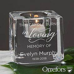 this candle burns in loving memory of evelyn murphy, inscribed with the words