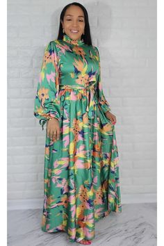 Material: Satin Style: Maxi Dress Long Sleeve Color: Green & Mul Fit True to size. The model is wearing a size Small with 36 Bust Size Recommended Small = 4/6 Medium= 8 Large= 10 XL = 12 1XL= 14 Green Floral Print Long Sleeve Maxi Dress, Green Long Sleeve Maxi Dress With Floral Print, Green Maxi Dress With Floral Print For Garden Party, Long Sleeve Green Maxi Dress With Floral Print, Vibrant Green Midi Dress For Spring, Multicolor Print Dress For Garden Party, Green Spring Maxi Dress With Vibrant Print, Green Colorful Summer Maxi Dress, Spring Green Maxi Dress With Vibrant Print