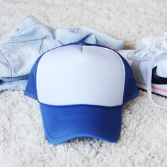 The perfect blue trucker hat for the season. A sweet blue pairs with soft mesh sides and a white front. Darling paired with a tee & jeans. Color: Blue Adjustable White Mesh Trucker Hat For Spring, White Mesh Snapback Hat For Spring, Casual Mesh Snapback Hat For Spring, Casual Mesh Baseball Cap For Spring, Casual Mesh Hat For Spring, Spring Mesh Trucker Baseball Cap, Spring Mesh Trucker Hat, Mesh Trucker Baseball Cap For Spring, Casual Mesh Trucker Hat For Spring