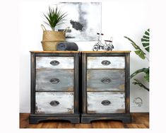 two white and gray drawers with plants on top