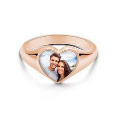 Are there certain pictures or people that make you feel all warm and fuzzy inside? If so, then photo charm rings are a must for you! We offer a vast range of photo charm rings that you can customize with pictures of your choosing. Slip in pictures of your children, your partner, your pets, or anything else that you love looking at. Material：copper Photo Ring, Photo Charms, Heart Shaped Rings, Birthday Ring, Charm Rings, Photo Heart, Women's Jewelry, Gifts For Wife, Rose Gold Plates