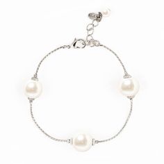 Simple and classic, this pearl bracelet will continue to be a jewelry staple year after year. Made by hand in our coastal New England workshop using genuine freshwater pearls. Product Details: 7 1/2" length; 1 1/4" extender 14K Gold or Rhodium plated chain 10mm freshwater pearls Lobster Claw Closure One Size Fits All Made in America Gift Box Included Adjustable Pearl Bracelet With Pearl Pendant, Adjustable Pearl Bracelets With Pearl Pendant, Adjustable Bracelet With Pearl Pendant, White Metal Pearl Bracelet With Jubilee Details, Elegant Beaded Metal Bracelets With Pearl Charm, Elegant Adjustable Chain Bracelet With Pearl Charm, Elegant Adjustable Pearl Charm Chain Bracelet, Silver Pearl Bracelet With Pendant, White Metal Bracelet With Pearl Drop