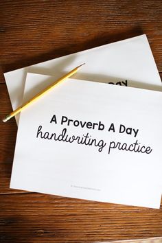 a proved a day handwriting practice on top of two envelopes with a pen