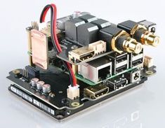 an electronic device with two cameras attached to it's motherboard and some wires