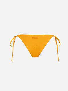 Timeless in design, this classic swim briefs with medium coverage is a summer wardrobe essential. Its slender and versatile straps secure at the sides, offering adjustable fittings to suit your hip size according to your preference, ensuring a customized fit for your tanMid rise cheeky swim briefsThins straps adjustable on the sidesOchre yellow plain colorComposition: 90% polyamide 10% elastaneModel is 176 cm and wears a size S Summer Swimwear With Adjustable Strap For Poolside, Adjustable Strap Swimwear For Summer Beach, Adjustable Strap Swimwear For Poolside In Summer, Summer Pool Swimwear With Adjustable Straps, Adjustable Strap Swimwear For Summer Pool, Fitted Swimwear With Adjustable Strap For Poolside, Adjustable Strap Swimwear For Summer, Fitted Swimming Bottoms With Adjustable Straps, Summer Poolside Bottoms With Adjustable Straps