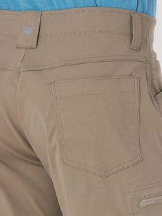 PERFORMANCE AND POCKET SPACE From exploring the outdoors to running errands around town, the men's Wrangler Authentics® comfort waist cargo short will keep you comfortable every step of the way. These performance shorts are crafted from a premium fabric blend with stretch, UPF 30 to shield you from the sun, and a moisture-wicking finish to keep you feeling dry. These cargo shorts for men come with a comfort flex waistband that adapts to every move you make, a relaxed fit for extra room, and a 10 Outdoor Khaki Cargo Shorts With Hip Pockets, Khaki Cargo Shorts With Hip Pockets For Outdoor, Utility Cargo Pants With Pockets For Adventure, Functional Cargo Shorts With Pockets For Outdoor Work, Urban Outdoor Bottoms With Hip Pockets, Utility Cargo Shorts With Relaxed Fit For Outdoor, Utility Cargo Shorts With Functional Pockets For Outdoor Activities, Utility Bottoms With Cargo Pockets For Adventure, Utility Cargo Shorts With Functional Pockets For Outdoor