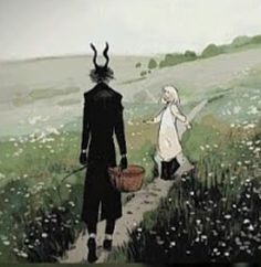 two people walking down a path with horns on their heads and one holding a basket