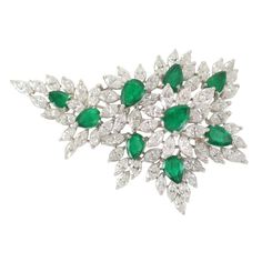 platinum Marquise diamond and pear shape Emerald brooch 
 59 marquise cut diamonds 12.50 caarats
 9 emeralds 12.00 carats Emerald Brooch, Titanic Jewelry, Synthetic Diamond, Vintage Jewelry Art, Antique Brooches, Sterling Silver Jewelry Handmade, Diamond Brooch, Green Jewelry, Marquise Cut Diamond