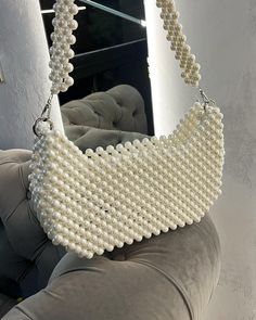 DAILY USE PEARL BAG, Price $150/ UAH 5700 The highest quality pearls🫶🏻 The convenient size of the bag fits the phone, and the rest of women’s important things♥️ worldwide delivery🌎 is available - write to order🙌🏻 ——————————————————- DAILY USE PEARL BAG Сумка в наявності) Price 150$ /5700грн Найякісніші перлини 🫶🏻 Зручний розмір сумки-телефон поміщається, та решту жіночих важливих речей♥️ є доставка по світу🌎-для замовлення пишіть🙌🏻 ————————————————- @beaded.bags @elleusa @elle @voguekorea ... Pearls Bag Diy, Pearl Purse Making, Beaded Pearl Bags For Events, Pearl Bead Purse, Pearl Begs, Pearl Bags, Hand Beaded Bag, Bead Bag, Sewing Easy Diy