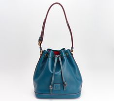 Gorgeous Florentine leather creates this bag's classic silhouette, while the drawstring closure is a modern and practical touch. From Dooney & Bourke. Leather Drawstring Bags, Hobo Handbags, Classic Silhouette, Leather Patches, Dooney Bourke, Fashion Handbags, Pebbled Leather, Drawstring Bag, Patch Logo