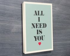 an all i need is you poster hanging on the wall