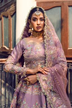 a woman in a purple bridal gown