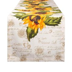 the table cloth has sunflowers painted on it