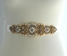 "Gold Sophisticated and elegant bridal bridesmaid , dress sash belt. Ready to ship \"Adele\" This is unique luxury bridal belt with large rhinestone crystal applique. Fully encrusted withgold large crystals and beads attached to double side satin ribbon. It will look great with any color dress, being either white, diamond, ivory, or antique. Looks great in the front , or on the side ! Made of - lovely stunning design applique decorated with tiny gold glass beads and crystal rhinestones in differ Dress Sash Belt, Wedding Dress Sash Belt, Belt Wedding Dress, Rustic Wedding Gowns, Bridesmaid Belt, Belt Luxury, Bridesmaid Sash, Celebrity Wedding Dresses, Gold Wedding Dress