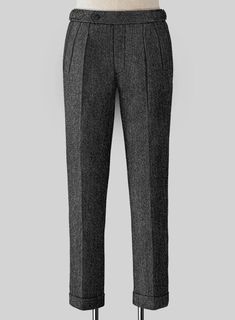 The Stone Charcoal Highland Tweed Trousers are the smartest dress that most men will need outside professional offices. Crafted from 100% wool, the trousers are beautifully tailored for a timeless appearance so that nothing can knock the blue pants in fine tweed. 
 
 Look Includes  Stone Charcoal Tweed Fabric  Cross Pocket  Forward 2 Pleats  Side Tabs (No Loops)- Arrow Shape  Bottom Cuff (1.5")  Two Welted Back Pockets on Trousers   
 You can change the look during customization if required. Tailored Classic Tweed Bottoms, Classic Tailored Tweed Bottoms, Classic Tweed Business Pants, Tweed Bottoms With Welt Pockets For Workwear, Classic Tweed Pants For Business Casual, Classic Fitted Tweed Bottoms, Business Casual Tweed Bottoms With Welt Pockets, Elegant Fitted Tweed Bottoms, Tailored Herringbone Bottoms For Workwear