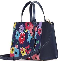 Don't miss the opportunity to make thisexquisite piece yours. Check out now to add a touch of floral elegance to yourensemble. Crafted with printed pebbled leather andadorned with a crinkle faux patent leather lining in a vibrant pop of color,this satchel exudes charm and sophistication. Wildflower Bouquet, Kate Spade New York, Pebbled Leather, Patent Leather, Bags Handbags, Color Pop, Kate Spade, Satchel, Bag Lady