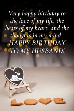 happy birthday card for husband with heart shaped cookies in front of him and the words,'very happy birthday to the love of my life, the beats of my