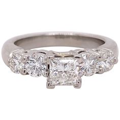 Blue Nile Diamond Engagement Ring Style: Solitaire with Accents AGS Diamond Grading Report: #7438305 Metal: Platinum Size: 6.5 - sizable TCW: 1.36 tcw Main Diamond: Princess Diamond 0.70 cts Color & Clarity: G - VS1 Accent Diamonds: 4 Round Diamond 0.66 tcw Color & Clarity: H - VS2 Hallmark: PLAT Includes: AGS Diamond Certificate - Blue Nile Appraisal - Elegant Ring Box Retail: $7,750 Sku#13600TGC091620-6.5 Engagement Rings Under 1000, Unique Diamond Wedding Rings, Engagement Ring Style, Engagement Rings Channel Set, Princess Diamond Engagement Rings, Diamond Princess, Engagement Rings Princess, Diamond Ring Princess Cut, Platinum Engagement Ring