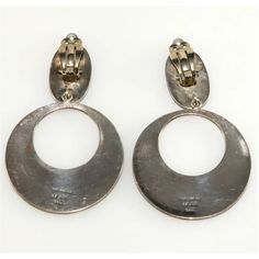 This is part of Chairish’s Costume Jewelry assortment.  Not your average abalone! Dangling high quality hoop earrings crafted of fine sterling silver with beautiful abalone shell inlay featuring birds and flowers. Marked Mexico TF32 .925. Mark indicates they were made in Taxco, likely made by German Fuentes Flores (of the Margot de Taxco related Fuentes family) according to "The Little Book of Mexican Silver Trade and Hallmarks" (Third Edition) by Bille Hougart. Measure about 3 inches long and j Sterling Silver Clip-on Hoop Earrings, Sterling Silver Round Clip-on Jewelry, Mexican Silver Jewelry, Birds And Flowers, Round Rock, Earring Crafts, Accessories Jewelry Earrings, Abalone Shell, Gold Plated Earrings