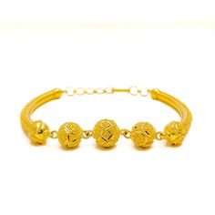 This 22k gold flexi bangle bracelet, weighing 11.9 grams, radiates upscale sophistication with its beaded design. The yellow gold finish adds a rich, warm glow. It's shaped to fit comfortably with a 2.2" diameter and an oval opening, enhanced by 0.8" adjustable links for a custom fit. The secure hook lock ensures it stays in place. Perfect for those who appreciate the blend of classic beadwork with the flexibility and comfort of modern design. PRODUCT DETAILS Gold Purity(karat): 22k Gold Weight( 22k Yellow Gold Bangle Bracelet, Adjustable 22k Gold Bangle, Traditional 22k Gold Bangle Bracelet, Gift 22k Gold Yellow Bangle, Adjustable Yellow Gold 22k Bangle, Bridal Jewelry Necklace, Precious Stones Rings, Diamond Pendant Sets, Fancy Necklace