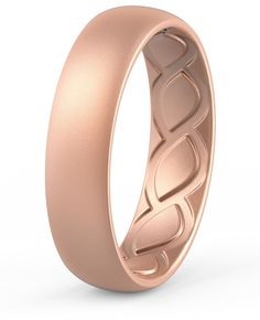 a rose gold wedding ring with the word love engraved on it