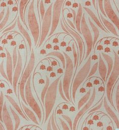 an orange and white wallpaper with red flowers on it