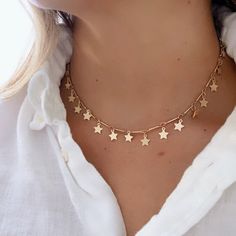 "Multi Star Choker Necklace, Tiny Star Choker Gold *Description & Details ♡ -Necklace length: 14\" + 4\" extension chain -Closure: Lobster Claw -Material: 18k Gold Plated Brass -100% US sourced. -Product type: Necklace" Golden Star Jewelry, Gold Modern Necklace, Star Choker Necklace, Trendy Star-shaped Jewelry With Adjustable Chain, Trendy Star-shaped Charm Necklace With Adjustable Chain, Trendy Star Charm Necklace With Adjustable Chain, Celestial Star-shaped Necklace With Adjustable Chain, Party Star Charm Necklaces, Trendy Star-shaped Charm Necklaces For Parties