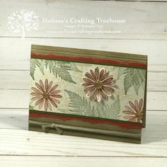 a close up of a card with flowers on it