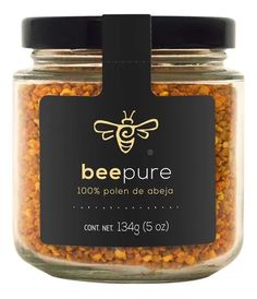 a jar filled with yellow beans and a black label on the side that says beepure