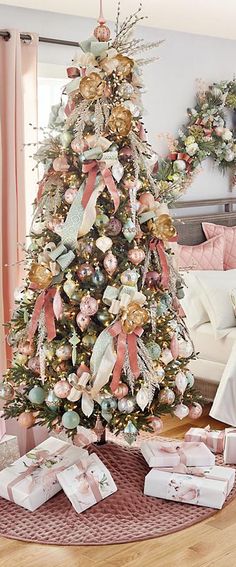 a decorated christmas tree in a living room with presents on the floor next to it