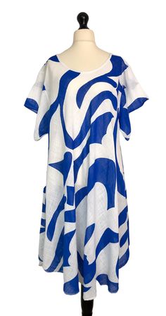 . In a lightweight cotton fabric in a vibrant bold print pattern, loose fitting knee length A-line style with a full skirt area and short wide sleeves . One size plus - to fit UK sizes 18 20 22 24 . Bust measures : 56 inches . Length from back of neck to bottom hem : 39 inches . Brand new with tags Blue Bold Print Summer Dress, Blue Oversized Summer Dress, Blue Summer Dress With Bold Print, Oversized Blue Summer Dress, Summer Blue Dress With Bold Print, Short Sleeve Dress With Bold Print For Vacation, Vacation Dress With Bold Print And Short Sleeves, Beach Dresses With Abstract Print And Short Sleeves, Graphic Print Short Sleeve Dress For Beach