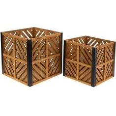 two wooden boxes sitting next to each other