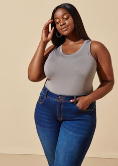 The Easy Basic Tank is the go-to layering piece that can be dressed up or down. Fitted and versatile, this staple can be worn all year long. We recommend sizing up for a more comfortable loose fit. Stretch Tank Top For Fall Layering, Gray Stretch Tank Top For Fall, Casual Stretch Tank Top For Fall, Gray Tank Top For Spring Layering, Versatile Relaxed Fit Tank Top For Layering, Casual Gray Tank Top For Layering, Versatile Tank Top For Fall Layering, Plus Size Trendy, Scoop Neck Tank Top