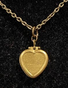 Necklace is antique bronze in color Measures 18 inches in length Locket measures .75 inches in length and depth Steampunk Heart, Vintage Lockets, Girly Bags, Harry Styles Pictures, Small Gift Bags, Heart Locket, Lava Stone, Locket Necklace, Clear Rhinestones