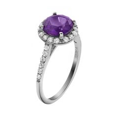 Decorated with purple and white cubic zirconia stones, this halo ring offers understated elegance. Comes in a gift box. Click on this JEWELRY & WATCHES GUIDE to learn about fit, styles, materials and more!RING DETAILS Width: .43 in. Metal: rhodium-plated sterling silver CUBIC ZIRCONIA DETAILS Cut: round Color: purple, white Setting: prong  Size: 9. Gender: female. Age Group: adult. Purple Brilliant Cut Diamond Ring For Formal Occasions, Formal Purple Diamond Ring With Brilliant Cut, Formal Purple Diamond Ring With Halo Setting, Elegant Purple Birthstone Ring With Center Stone, Elegant Amethyst Ring With Halo Setting, Classic Amethyst Diamond Ring With Brilliant Cut, Elegant Purple Diamond Ring With Center Stone, Formal Purple Ring With Halo Setting, Elegant Amethyst Ring With Cubic Zirconia And Prong Setting